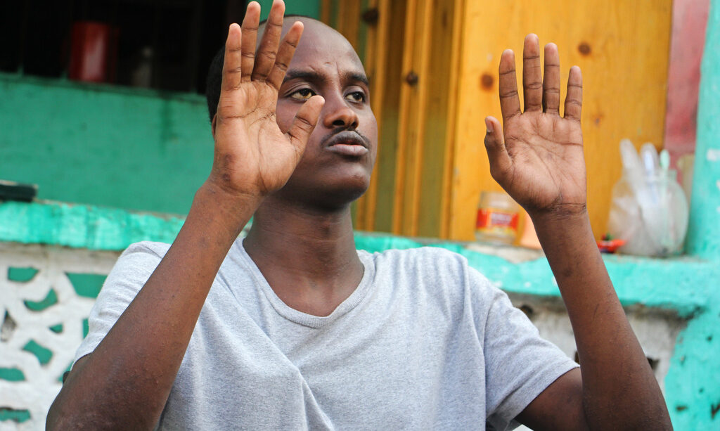 “My dream was America”: Somali migrant survives Libya detention Mohamed Abdi Awale, who says he was captured and tortured by smugglers while attempting to reach Europe, gestures during an interview with The Associated Press in Mogadishu, Somalia, Monday, Nov. 17, 2025.