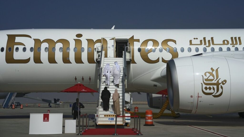 UAE issues travel warning for Mali amid rising safety concerns Visitors walk up the stairs to board an Emirates Airbus A380-800 during the Dubai Air Show in Dubai, United Arab Emirates, Thursday, Nov. 20, 2025.