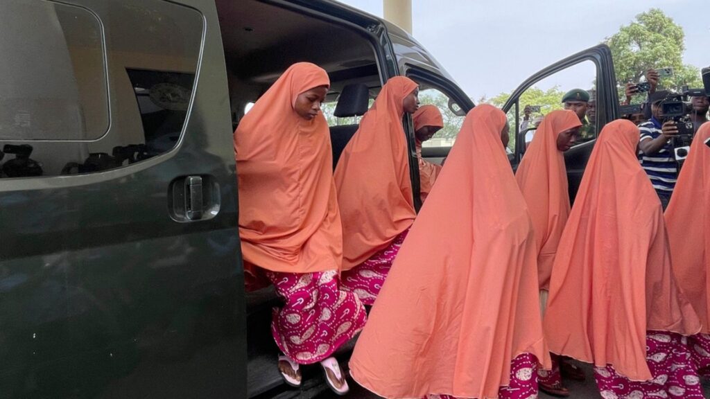 FILE - Freed students of the LEA Primary and Secondary School Kuriga leave a van upon arrival at the government house in Kaduna, Nigeria, Monday, March 25, 2024.
