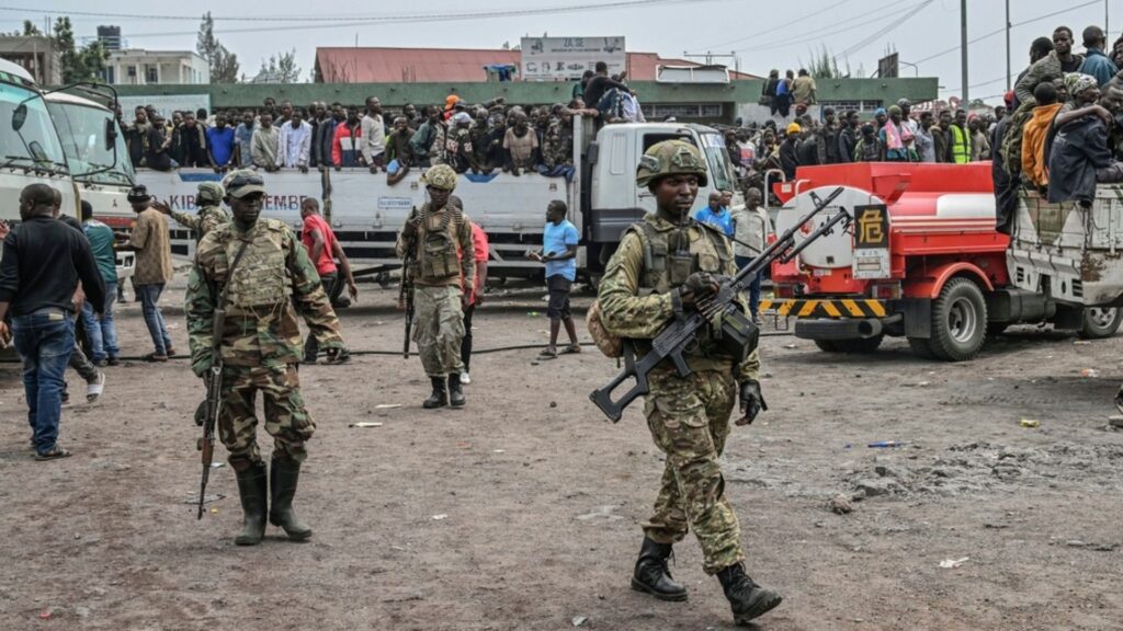 FILE - M23 rebels escort government soldiers and police who surrendered to an undisclosed location in Goma, Democratic republic of the Congo, Jan. 30, 2025.