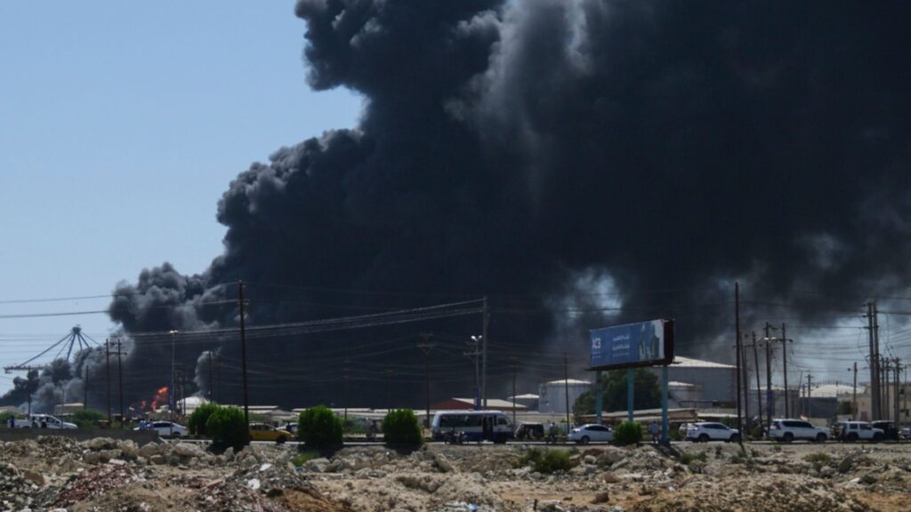 FILE - Smoke billows after drone strikes by the paramilitary Rapid Support Forces (RSF) targeted the northern port in the Red Sea city of Port Sudan, Sudan, May 6, 2025.