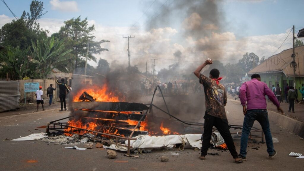 People protest in the streets of Arusha, Tanzania, on election day Wednesday, Oct. 29, 2025.