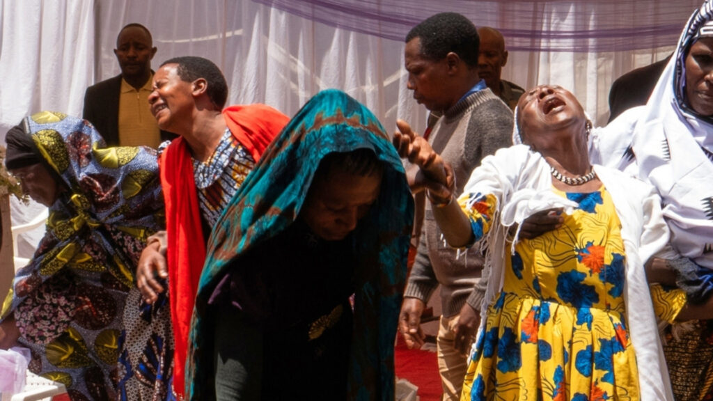 Mourners gather for the funeral of someone who died during post-electoral violence in Arusha, Tanzania, Tuesday, Nov. 4, 2025.